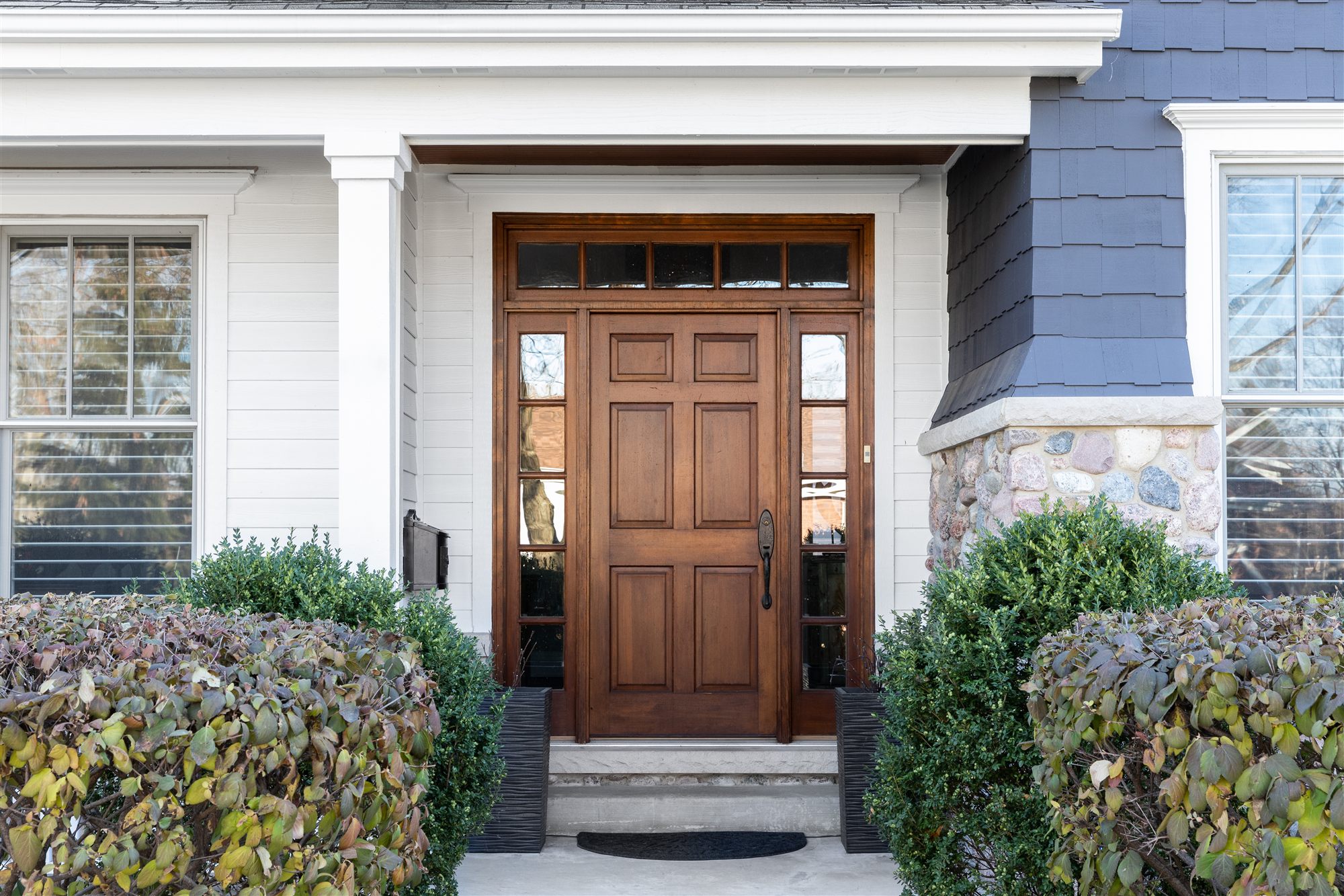 Craftsman front entry of a home designed by Rexford